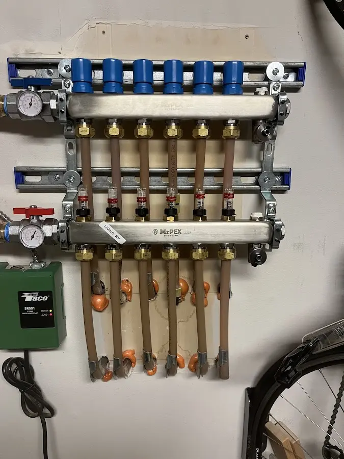 Plumber performing Water Heater Repair at a residential property in North Sioux City